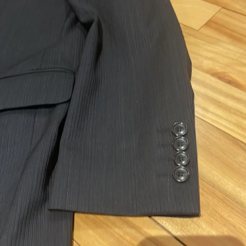 Marc Anthony black wool tonal pinstripe double button lined sport coat. 36S